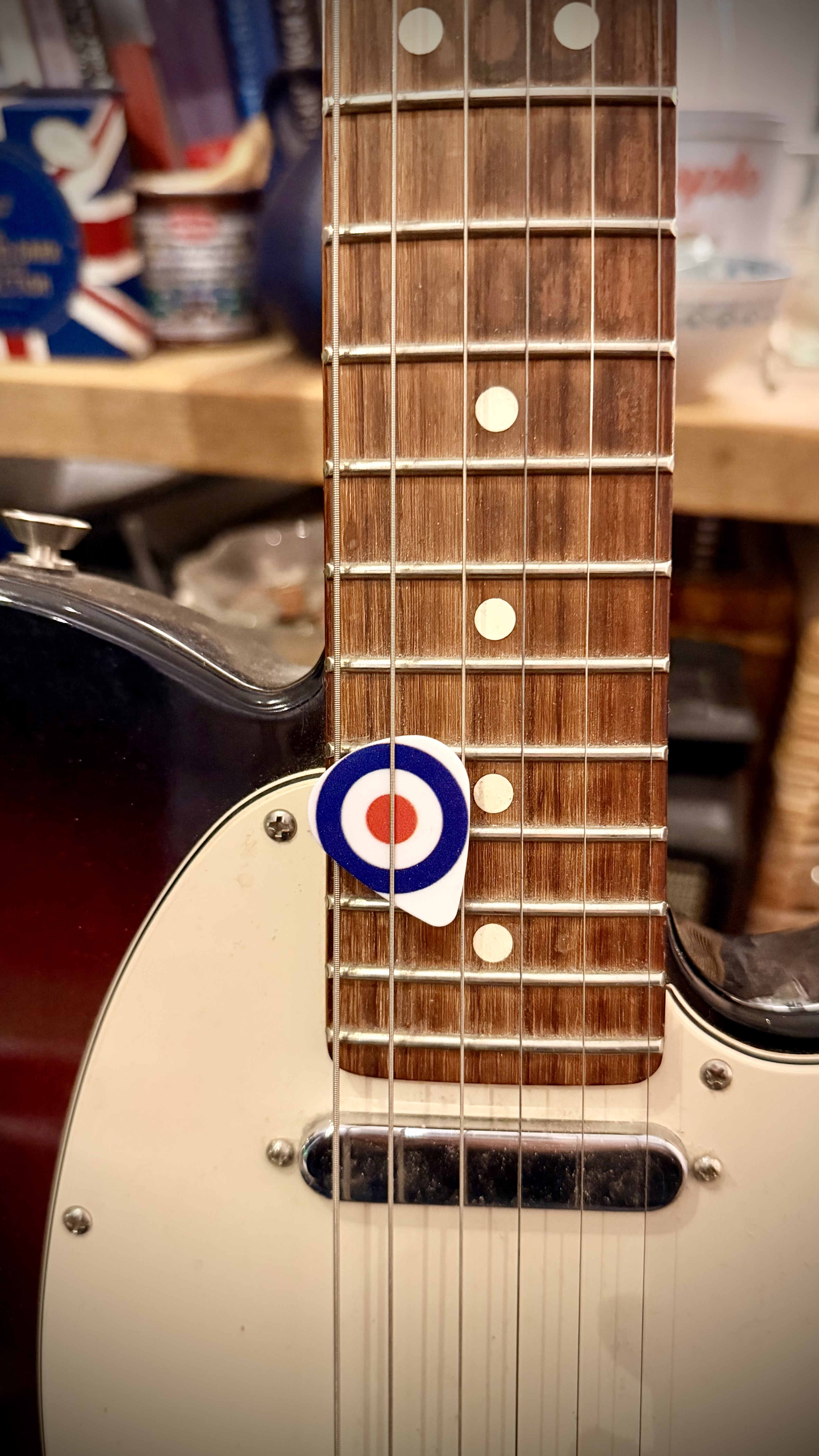 Roundel plectrum on Telecaster fretboard
